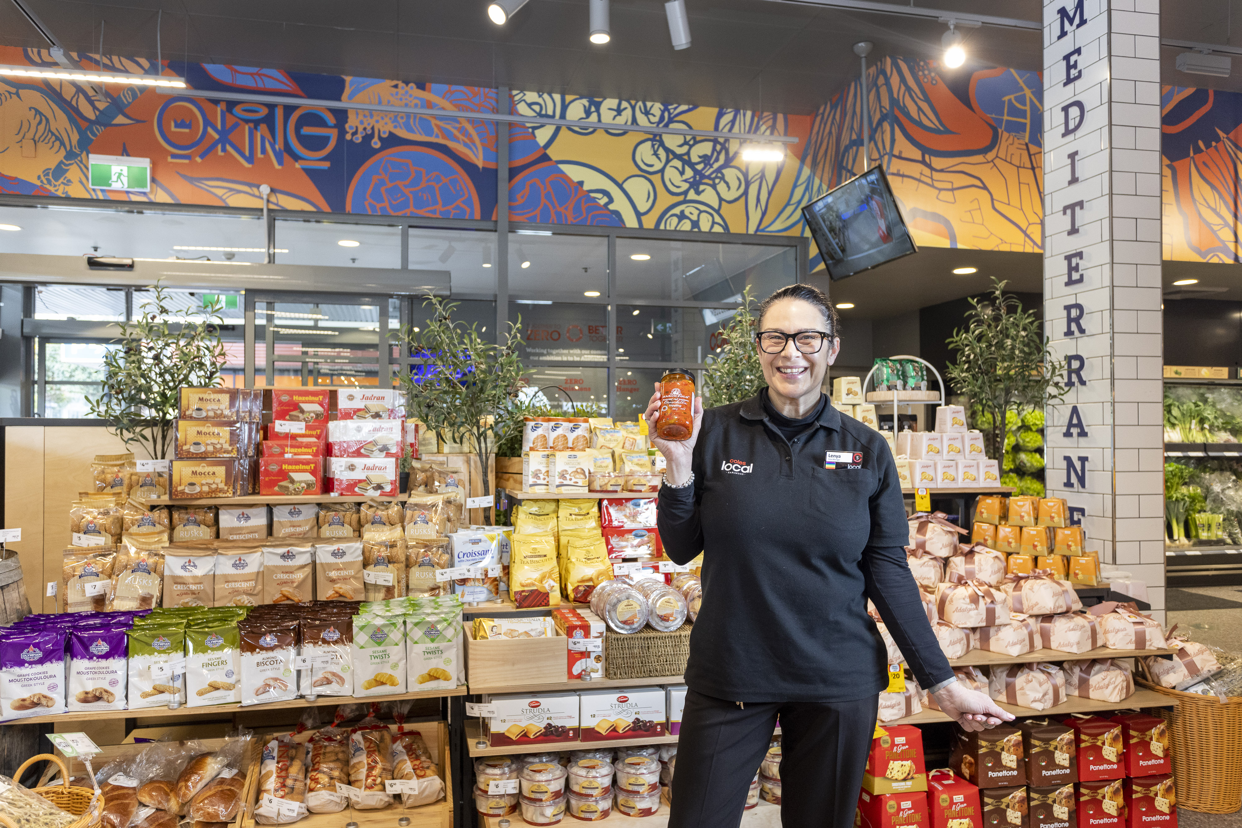 Coles Local Earlwood Store Manager Lenya Betteridge showcasing the store's tailored Mediterranean destination